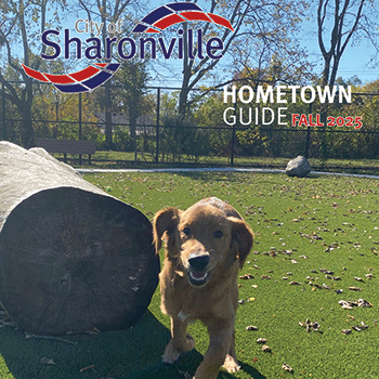 Fall 2025 Hometown Guide Cover featuring a dog playing in Gorman Dog Park.